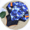 Maillot Rashguard Bleu Haut de Gamme pour Kite et Surf avec Motifs Oranges Subtils